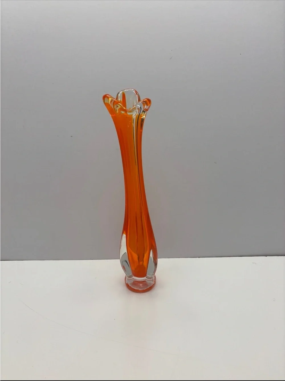 Vintage orange and clear glass swung bud vase